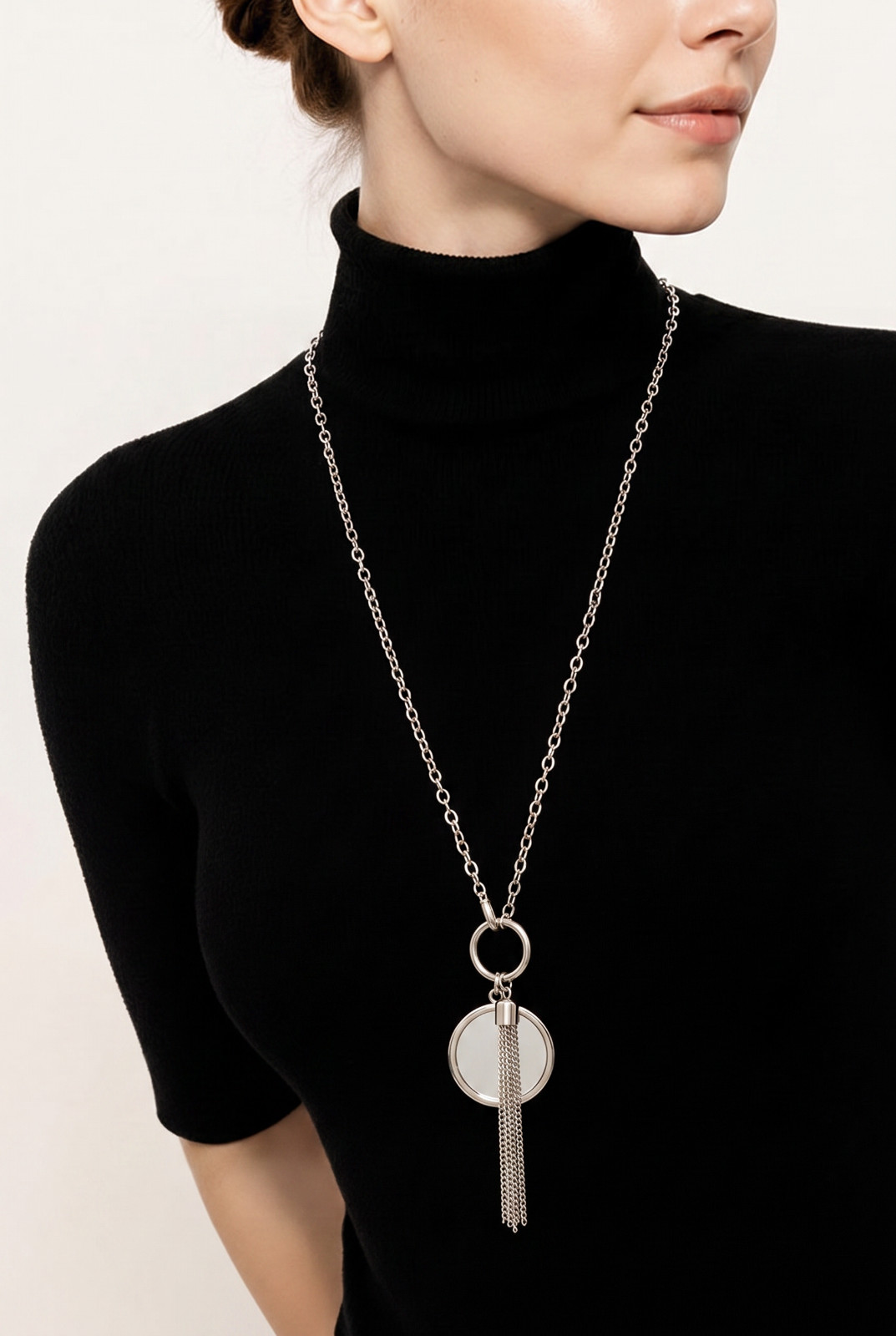 Long silver plated tassel pendant necklace, brushed disc statement