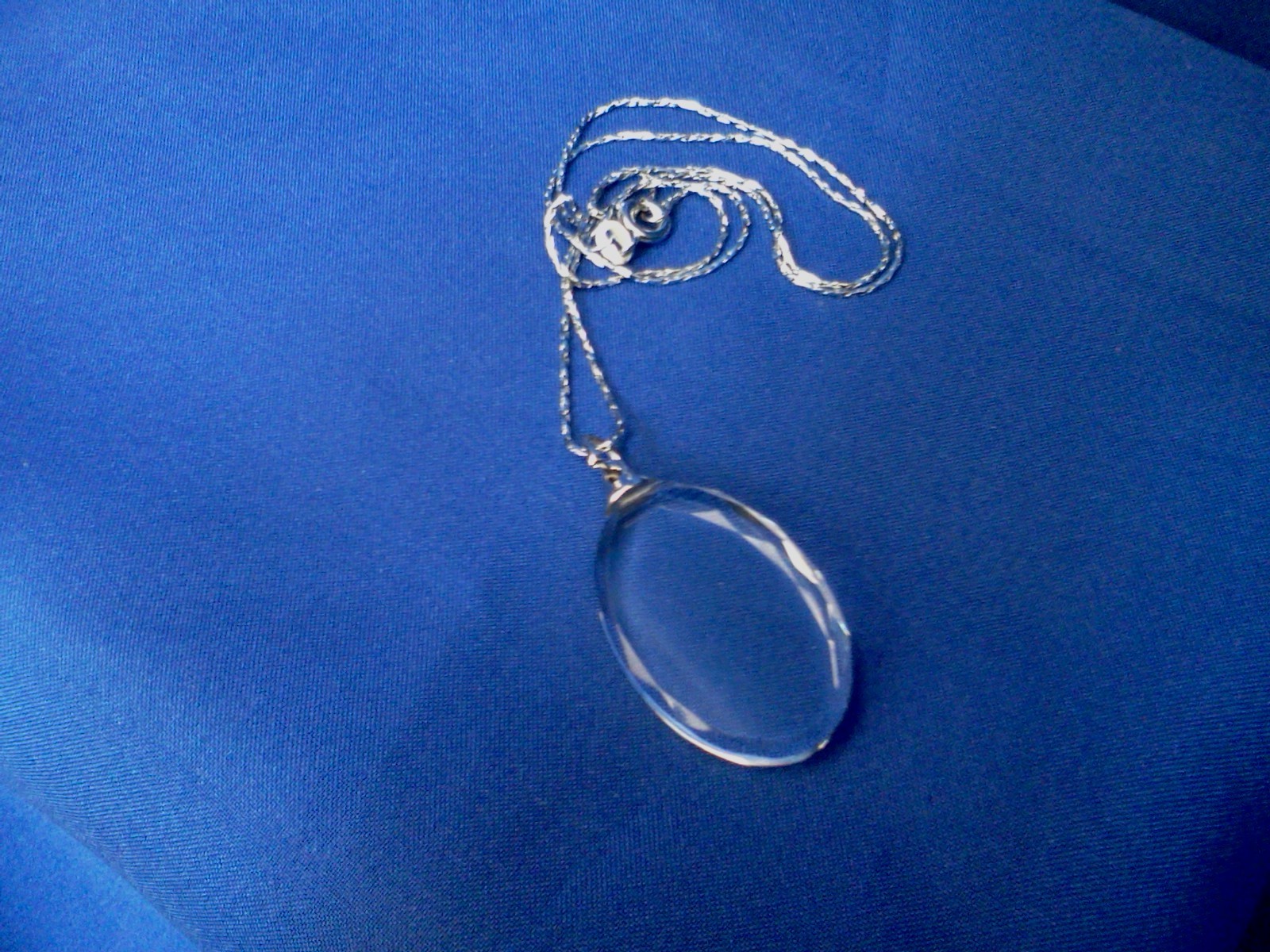 Qty of 10 required to purchase. Blank Oval crystal pendent.