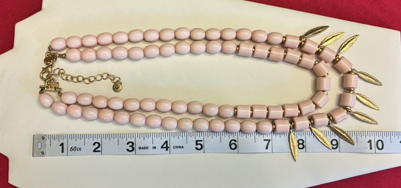 Versona Light Pink Bead Necklace with Attached Gold Tone Feather Accents