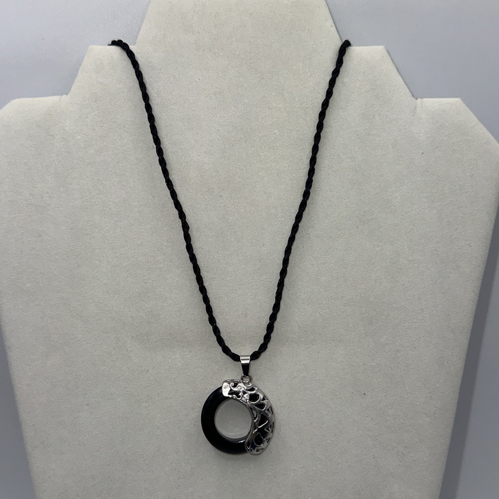Black Donut-Shaped Stone Necklace with Silver Woven Rope Chain