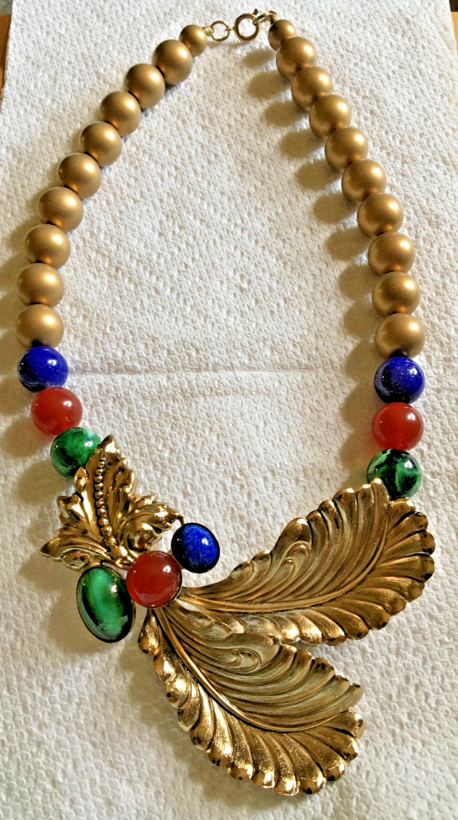 Ornate 18″ Necklace Golden + Stamped Metal Feathers? + Drilled Glass Beads