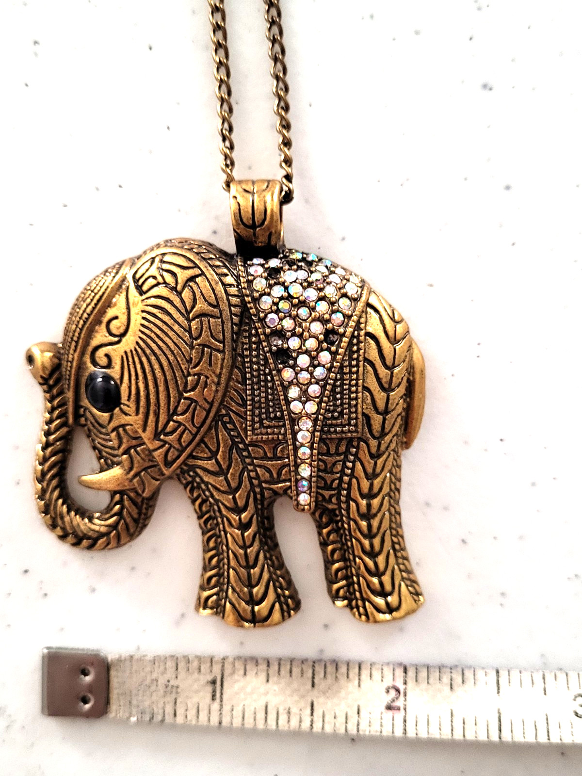Elephant pendant necklace intricate patterns brass-tone metal finish