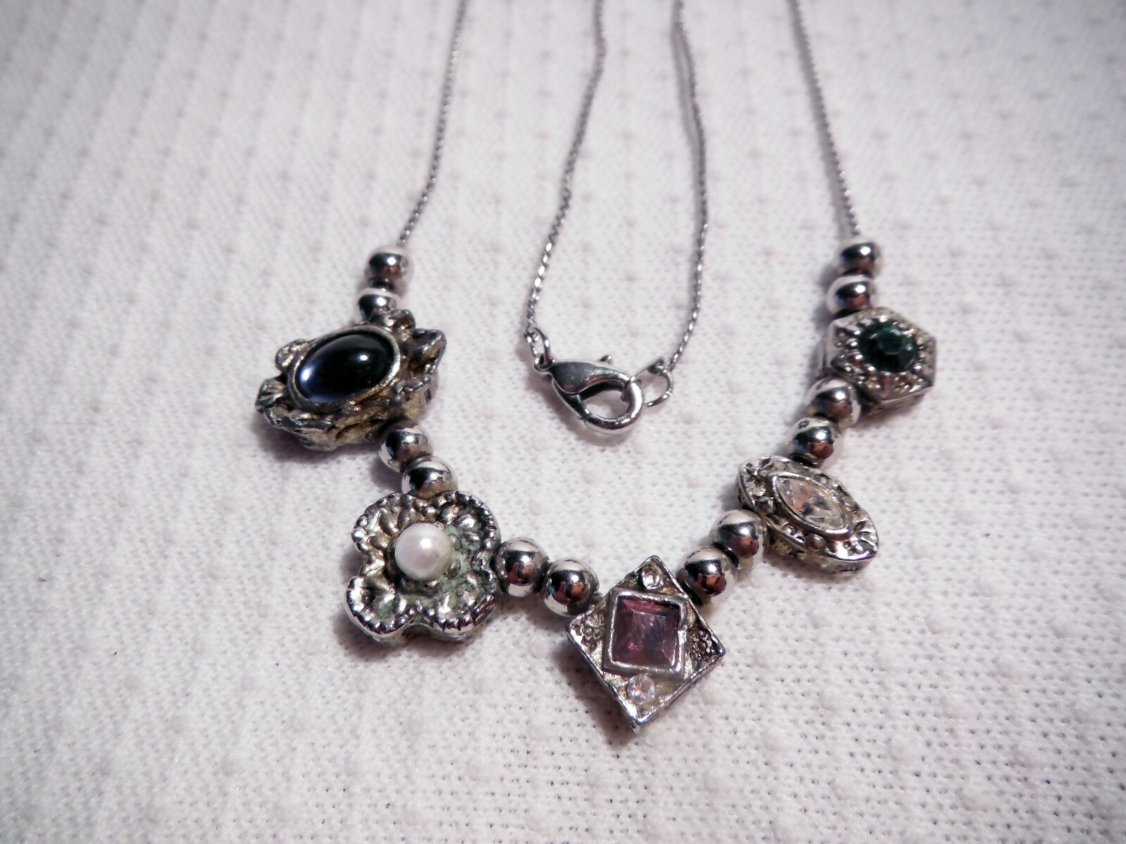 SILVER COLOR NECKLACE ~ VARIOUS COLORED STONES IN DIFFERENT SHAPES.