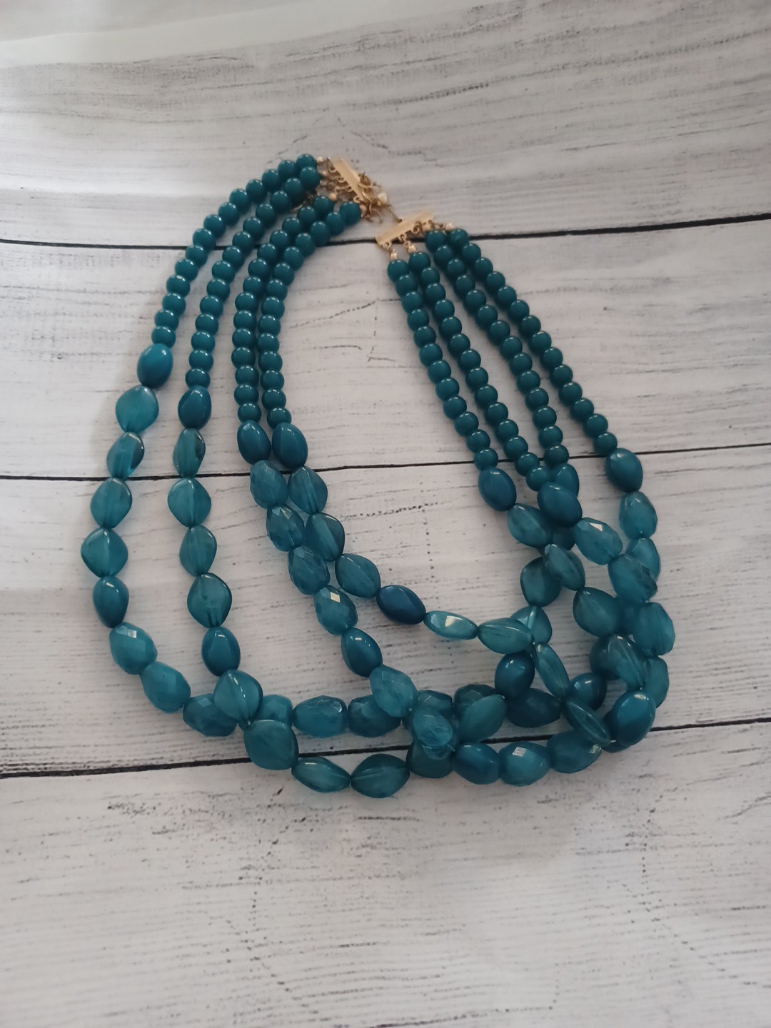 Versona Multi-strand teal beaded…