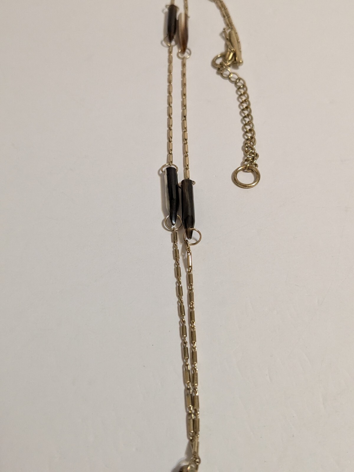 Gold Tone Y Drop Necklace With Acrylic Spear Shaped Beads. 28″ + 6.25″ Drop.