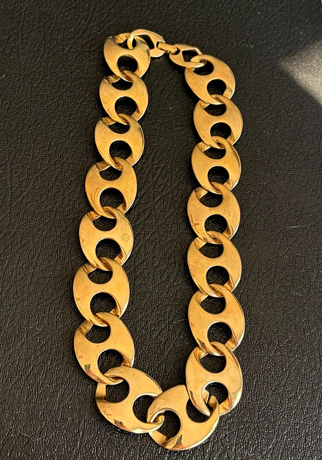 Vintage gold toned anchor link chain necklace with fold over clasp.