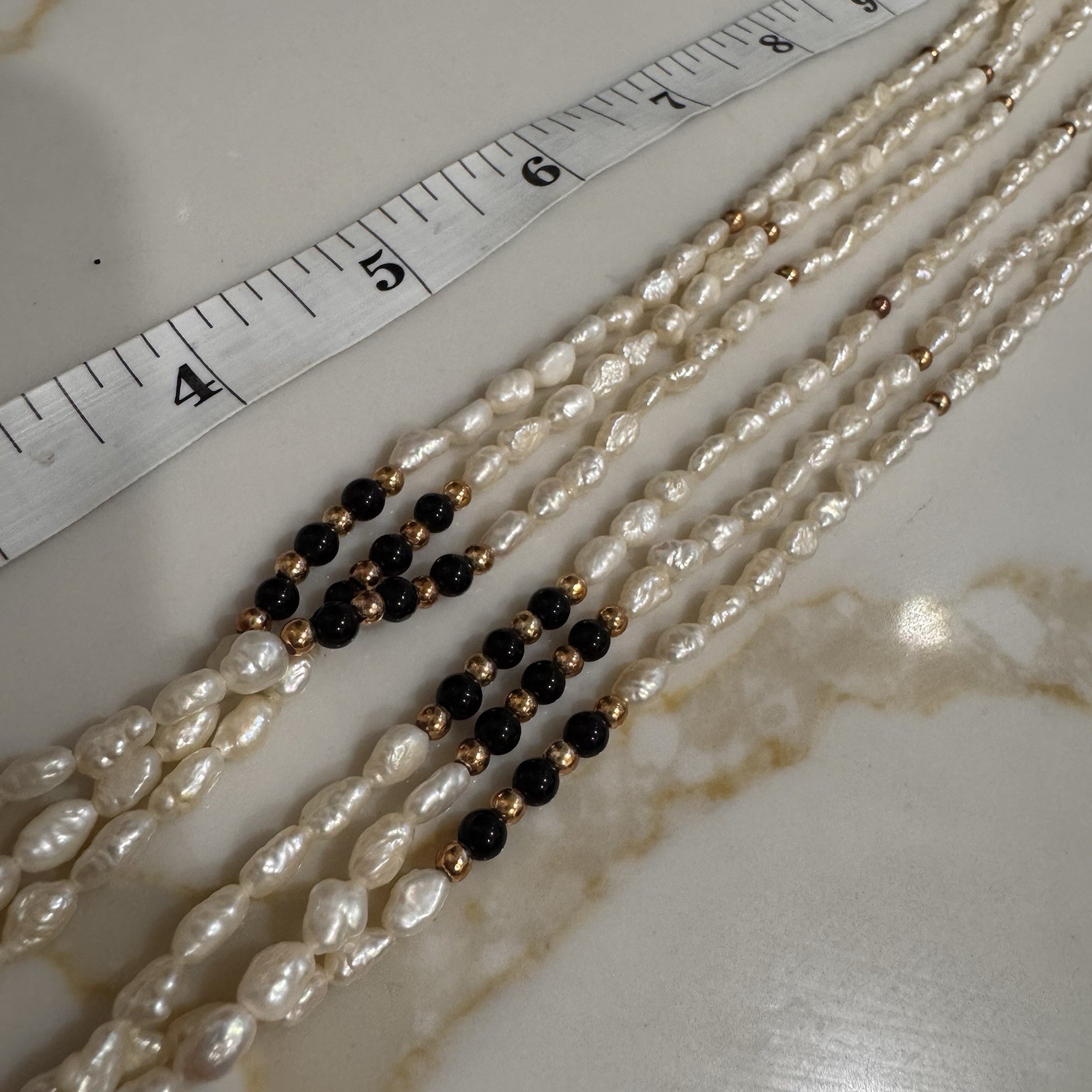 multi-strand baroque pearl beaded necklace black beads gold tone accents hook