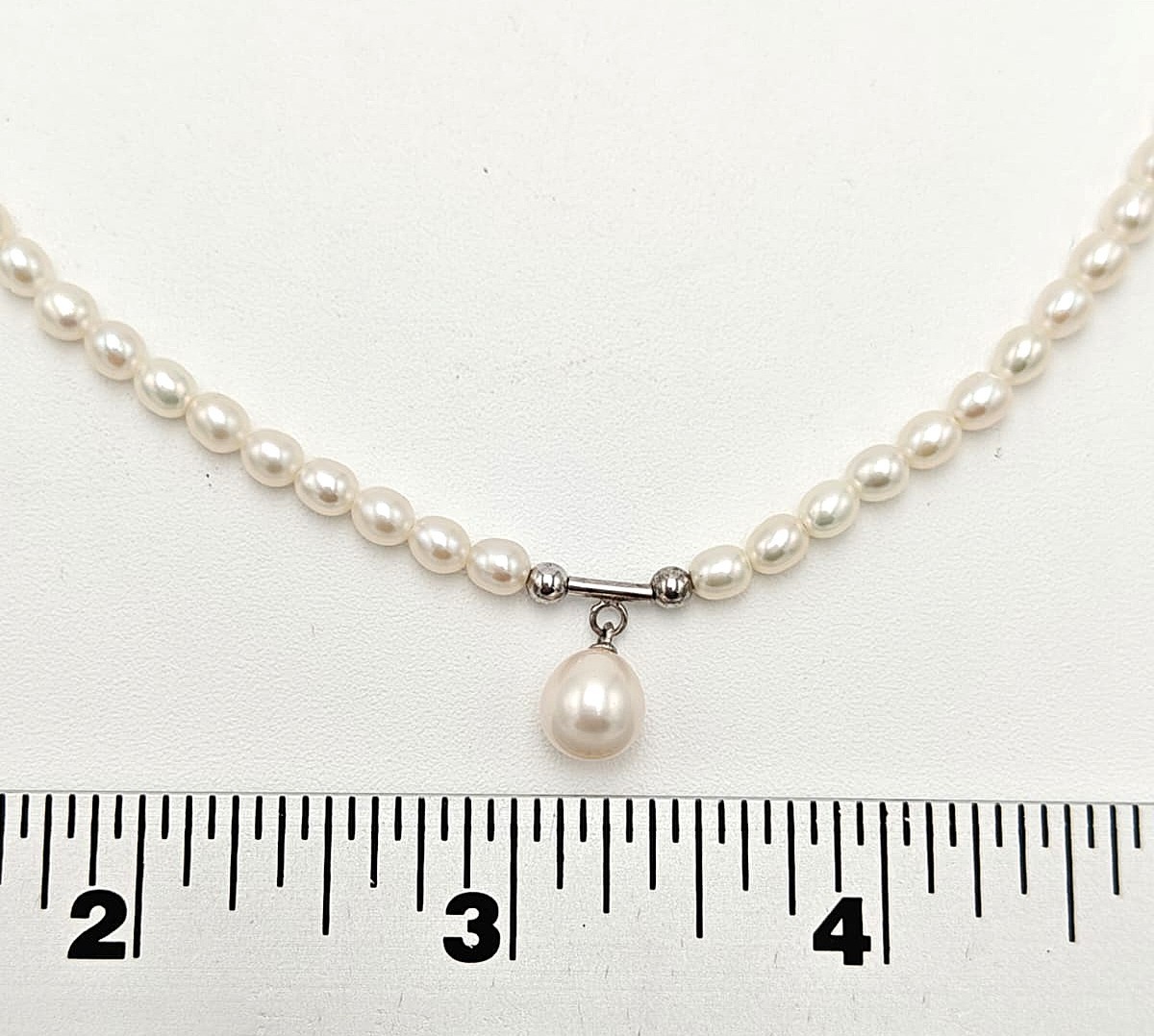 Natural Freshwater Pearl Necklace 16″ 4-5mm Oval White Pearls 7.5mm Drop Pendant