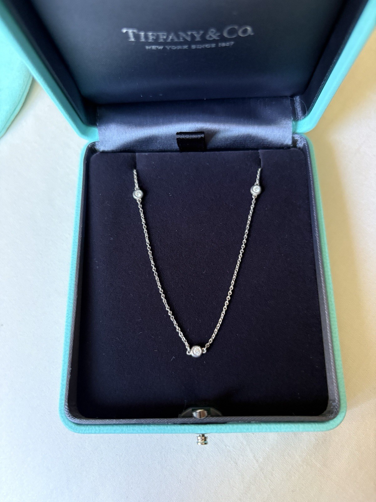 Authentic Tiffany & Co. Three round natural diamonds Necklace. NEW