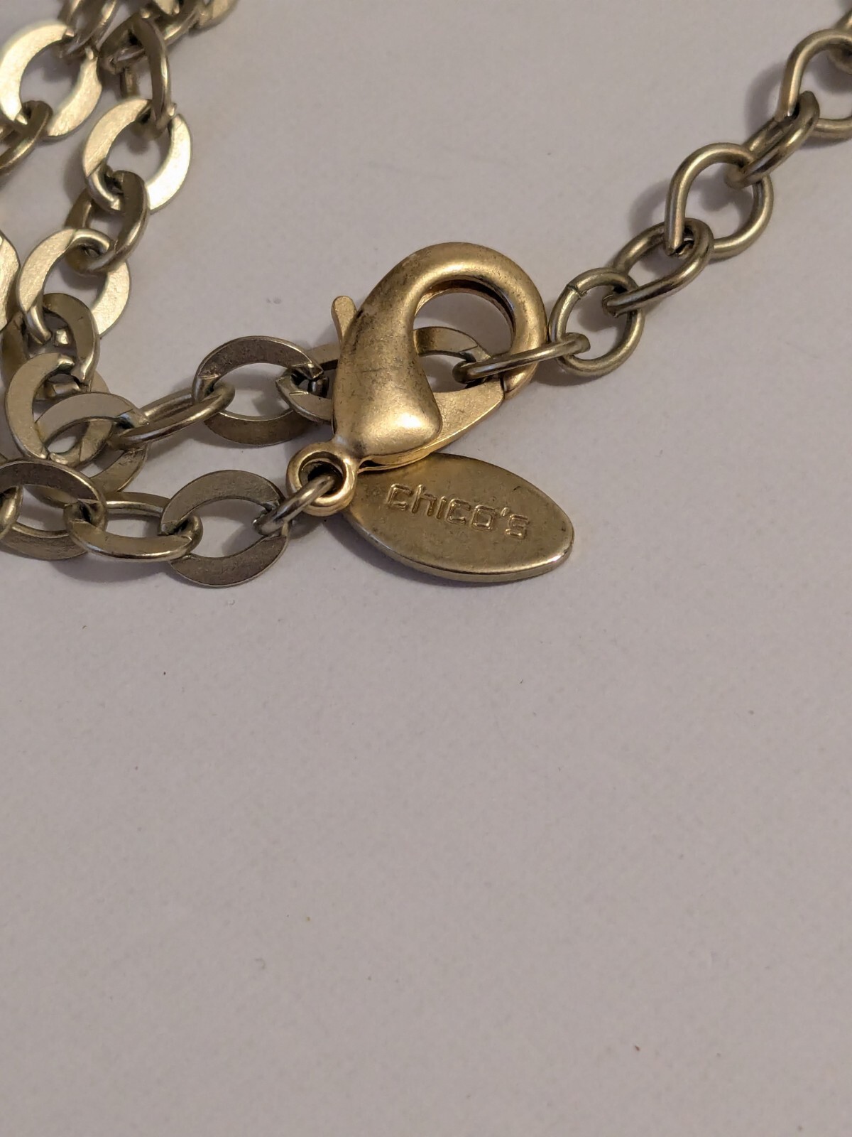 Chico’s Gold Tone Charm Heart Necklace With Multiple Charms & Beads. 34″. BOHO