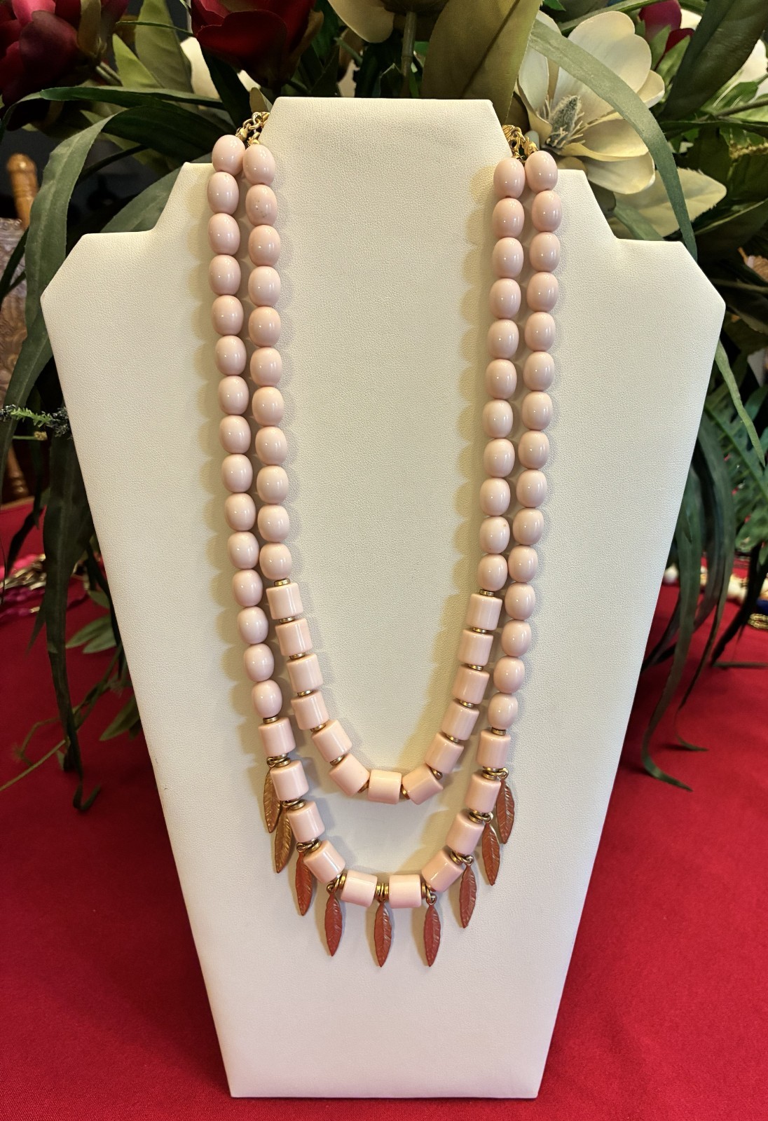 Versona Light Pink Bead Necklace with Attached Gold Tone Feather Accents