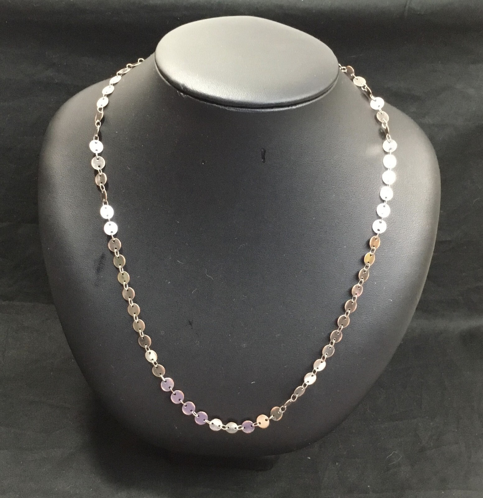 Two tone tiny disc necklace, silvertone discs worn to copper around edges, 20″
