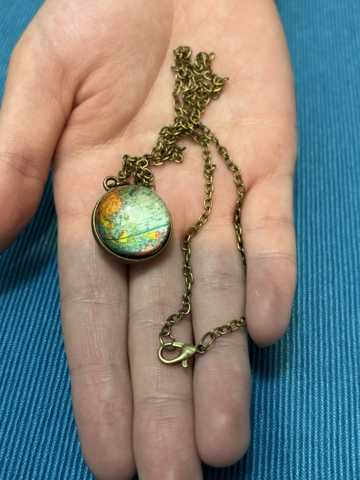 Earth Glow in the dark Pendant necklace.