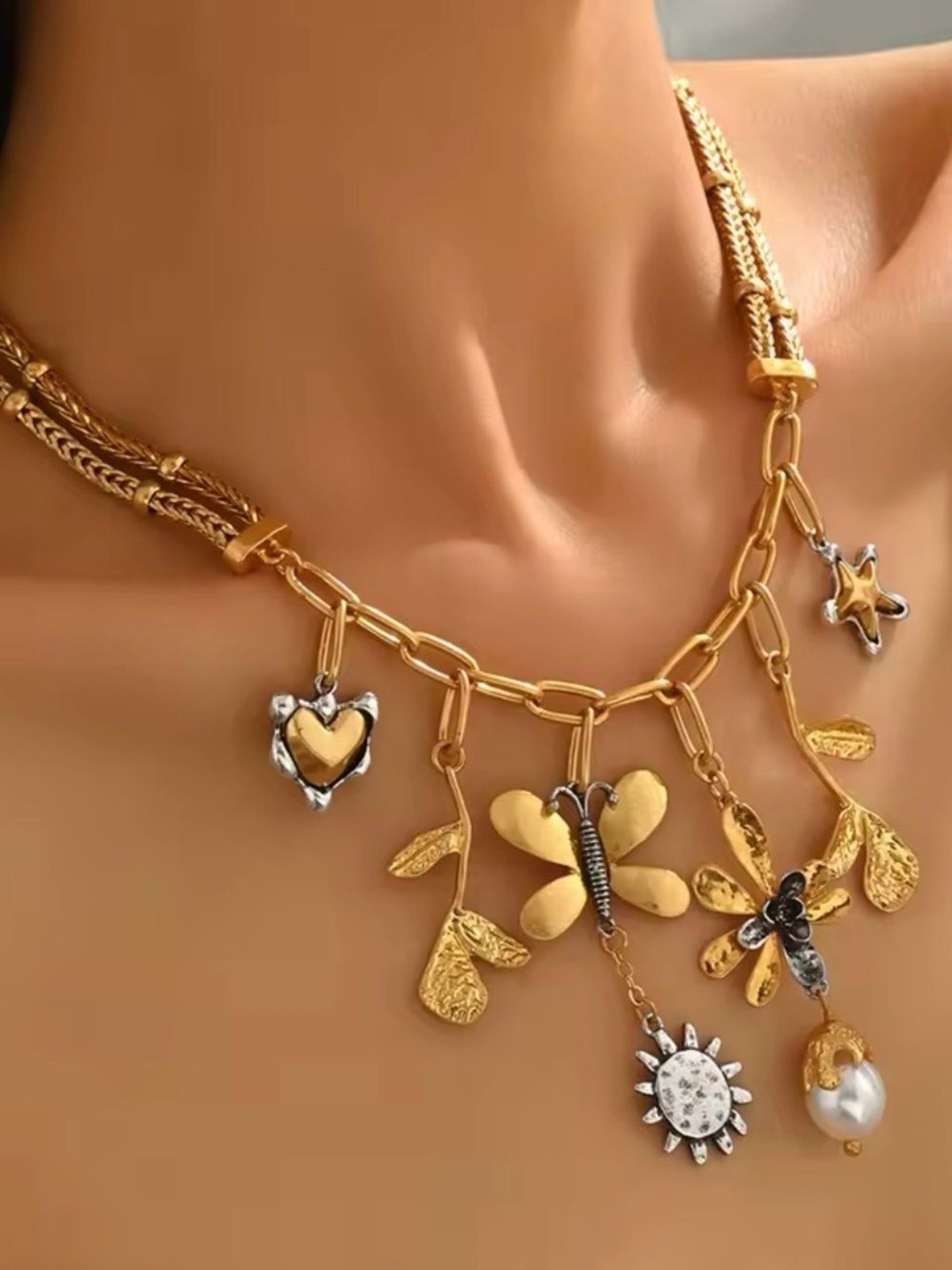 Gold-Tone Floral Charm Necklace with Mixed Metal Accents