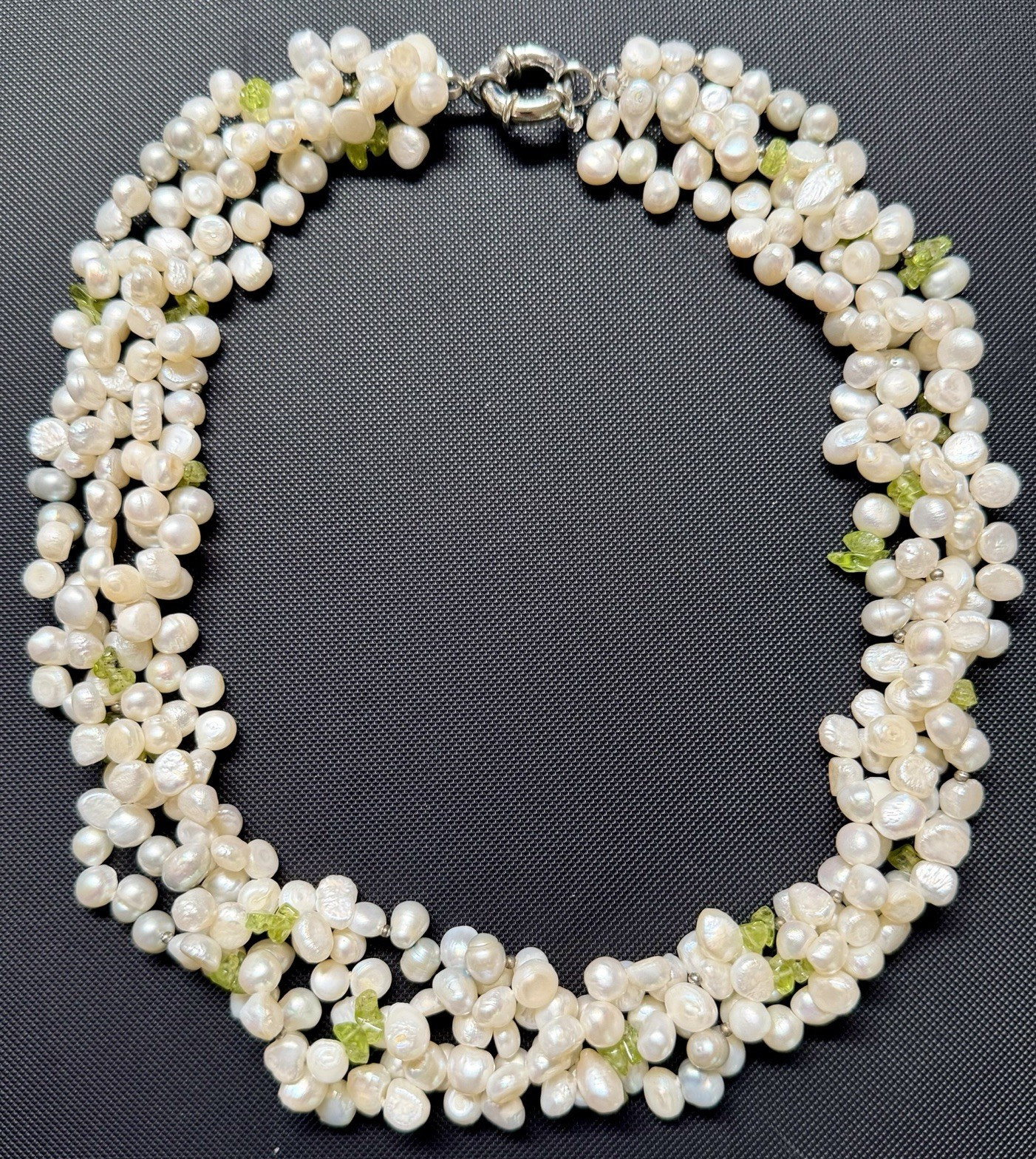 Multi-Strand Cultured Baroque White Pearl w/ Peridot Chip Necklace. 20” length.