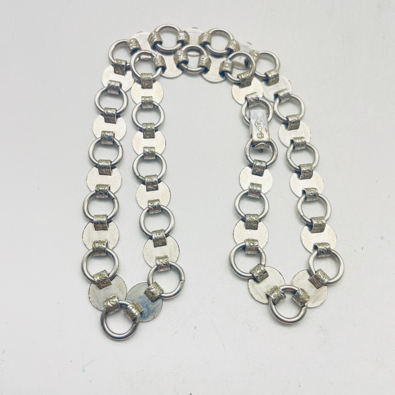 SARAH COVENTRY SAC Etched Necklace Silver Tone Disc Links Flat Lay