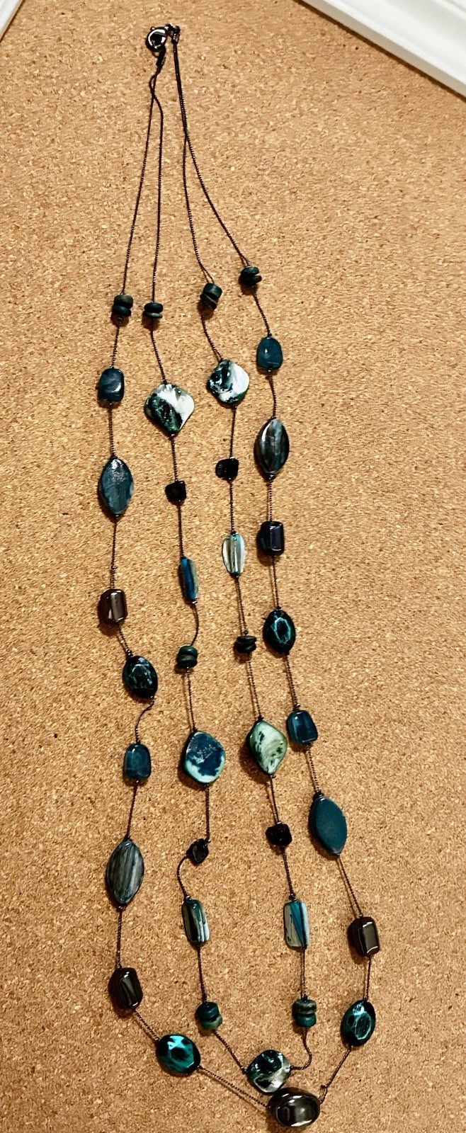 2 Strand 19 Turquoise Colored Beads On Black String