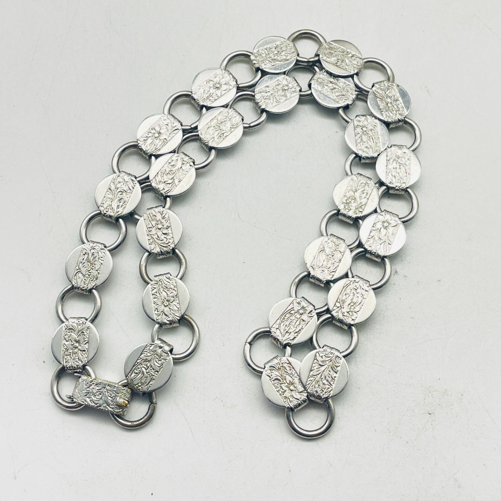 SARAH COVENTRY SAC Etched Necklace Silver Tone Disc Links Flat Lay