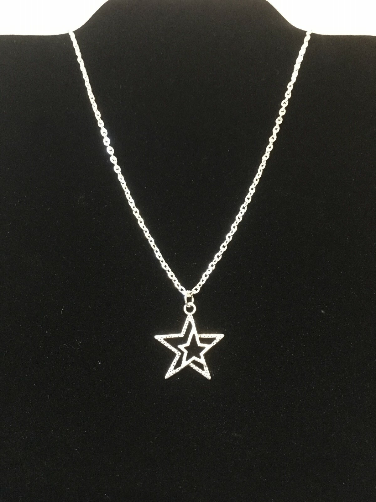TIBETAN SILVER STAR PENDANT ON SILVER PLATED 16 INCH CHAIN