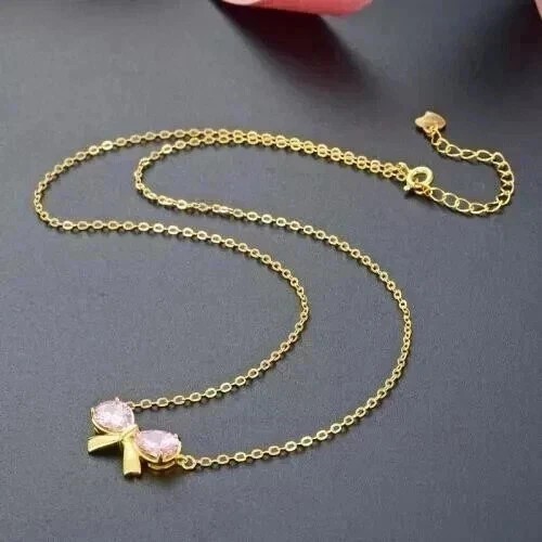 2Ct Pear Cut Simulated Diamond Women’s Bow Pendant In 14K Yellow Gold Plated