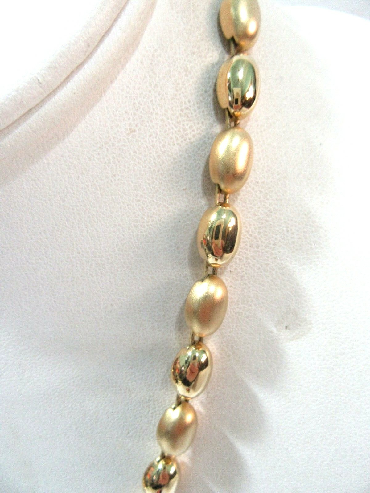Brushed and Shiny Gold Tone Oval Beaded Necklace Modern