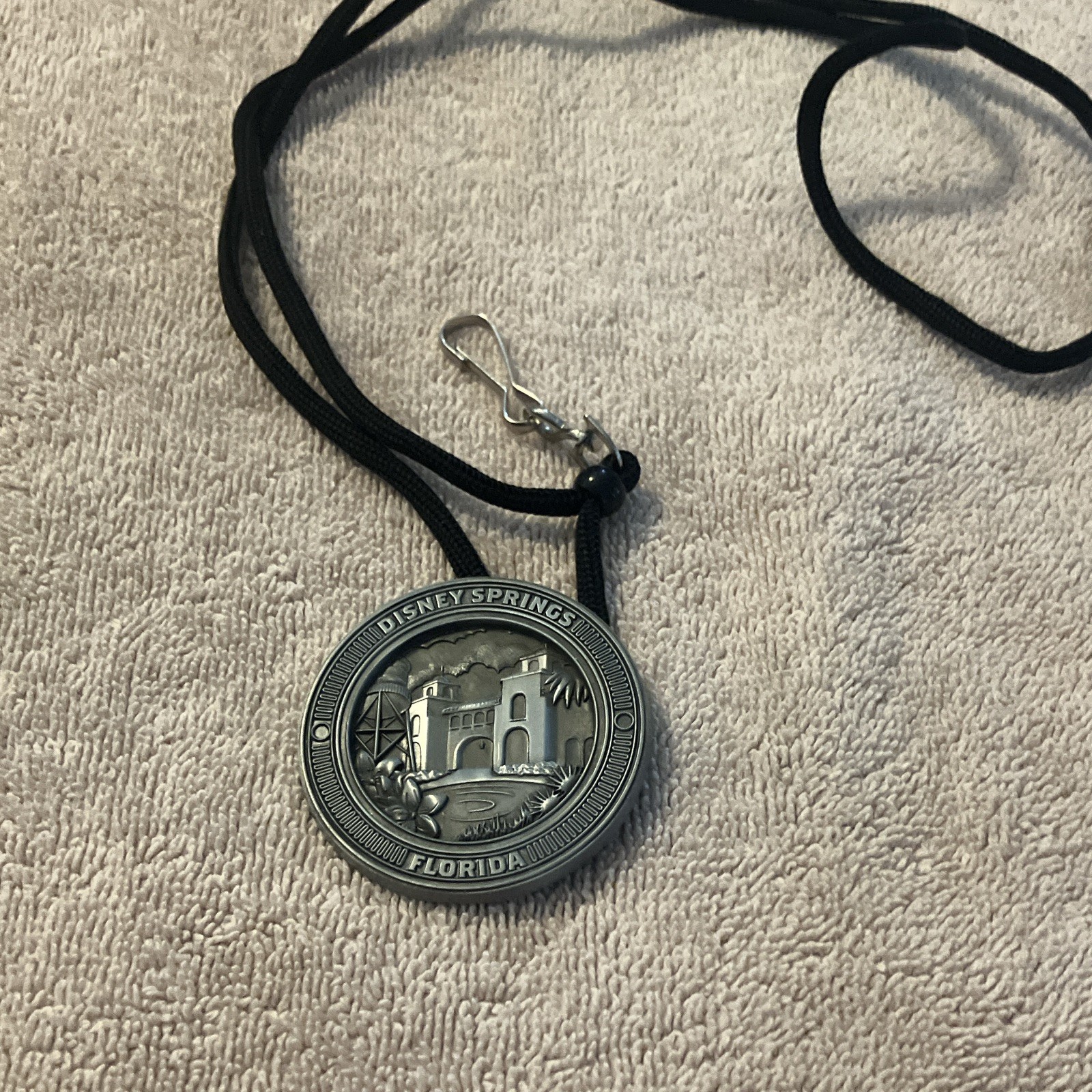 Disney Springs Florida Round Medallion Pendant Necklace Black Cord Hook