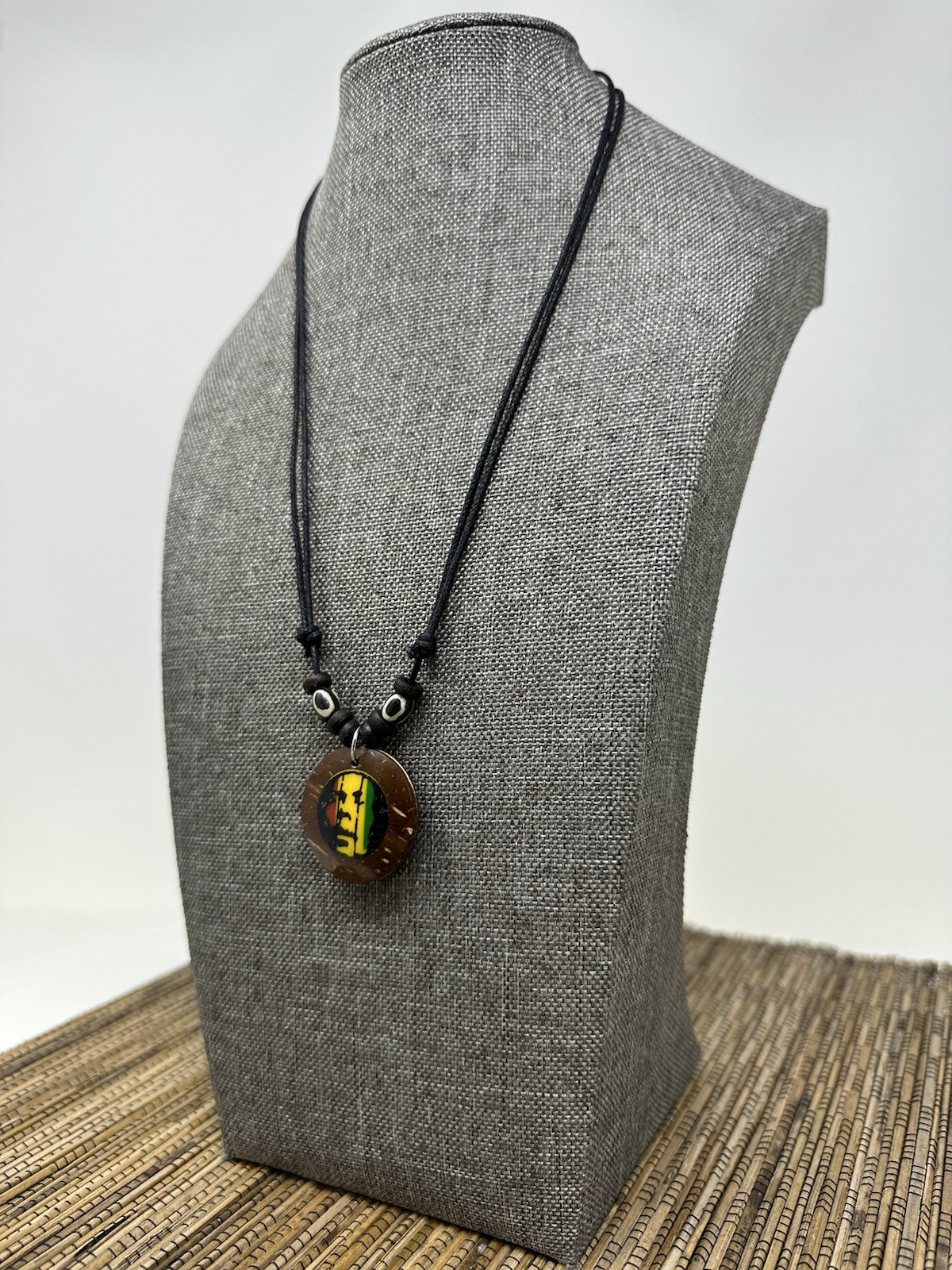 Handcrafted Rasta Coconut Shell Necklace – Symbol of One Love & Unity