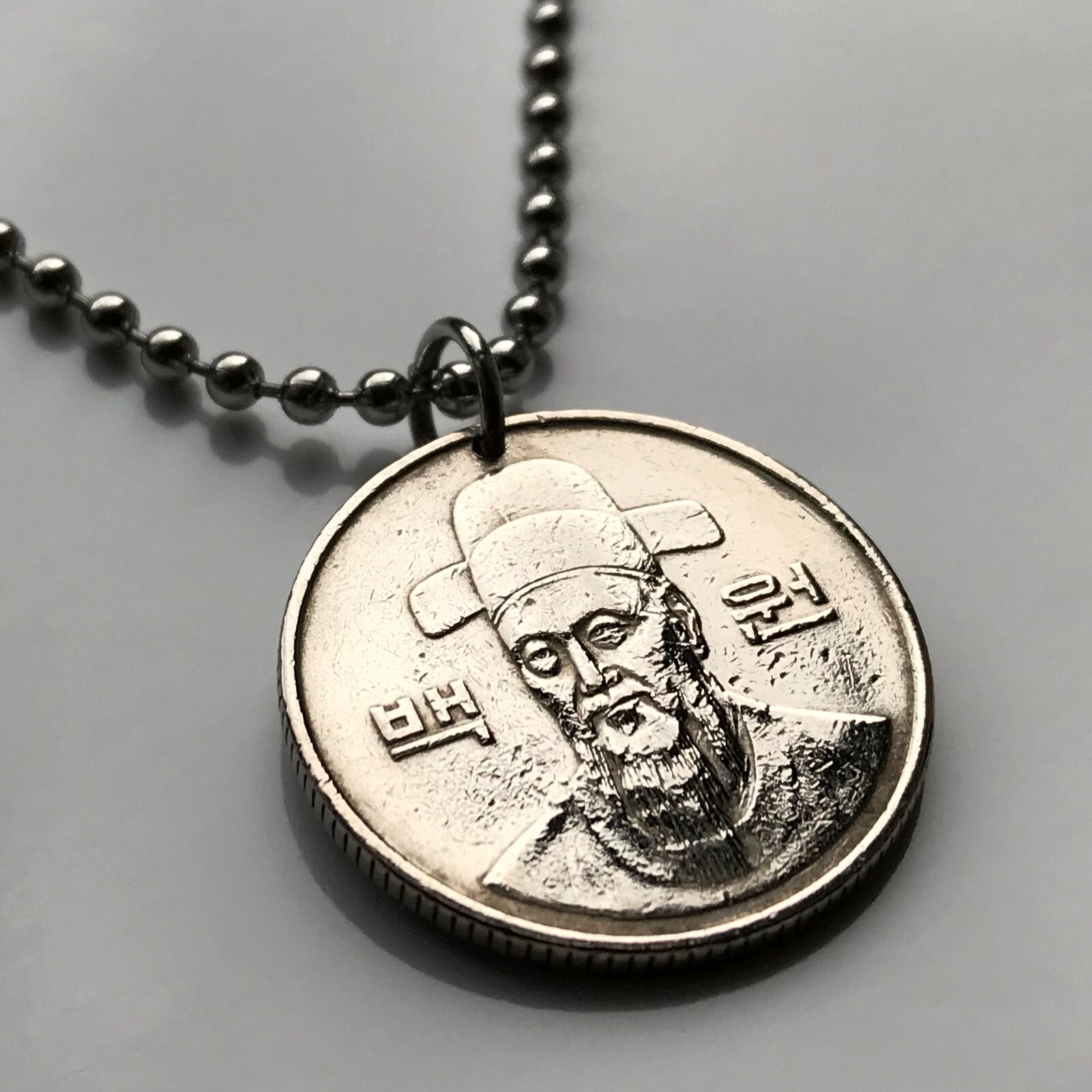 South Korea 100 Won coin pendant Admiral Yi Sun-sin Seoul Busan Incheon n001235