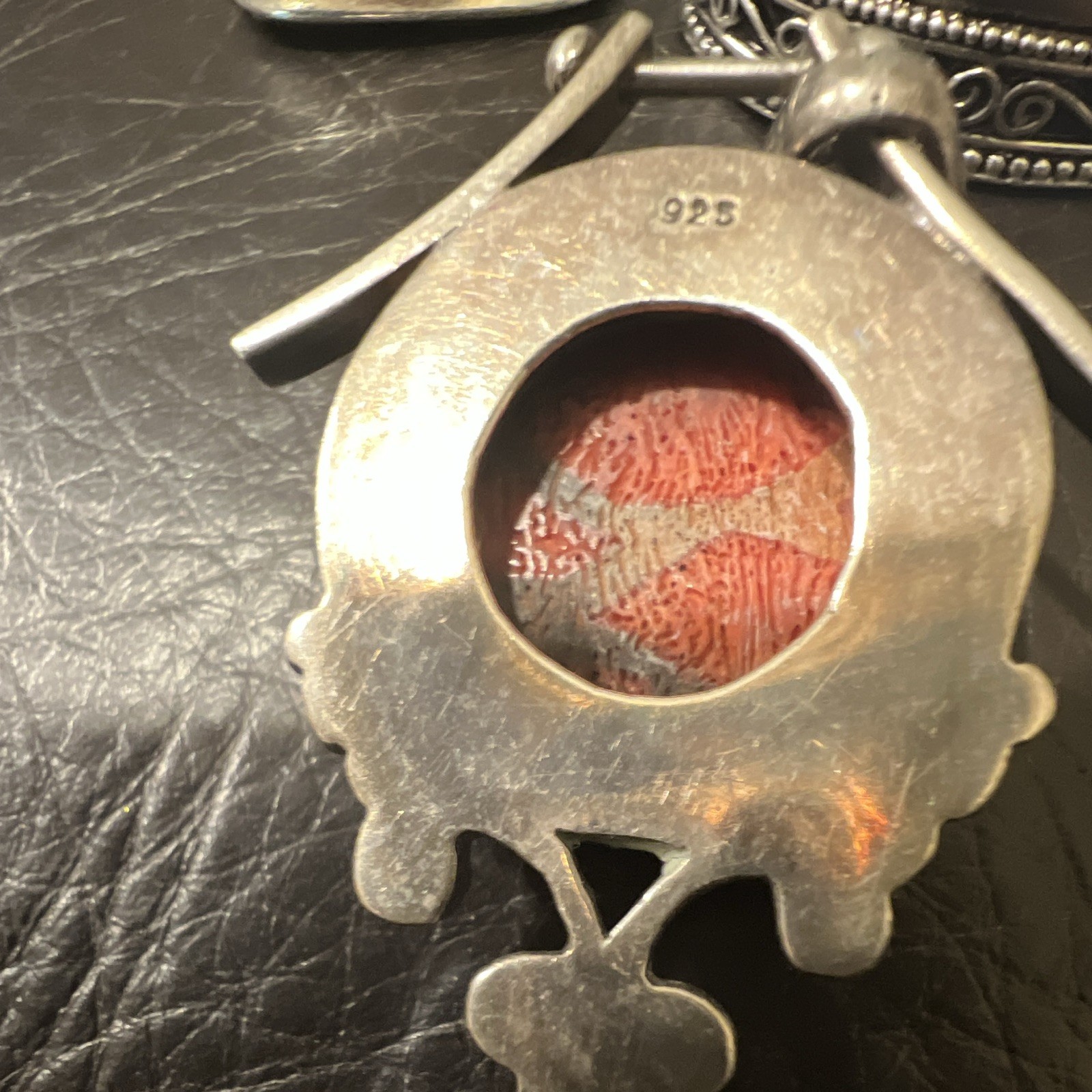 Multiple Pendants, Colorful, But In Sure Of What They Are made Of.