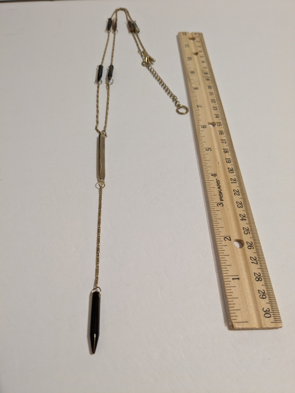 Gold Tone Y Drop Necklace With Acrylic Spear Shaped Beads. 28″ + 6.25″ Drop.