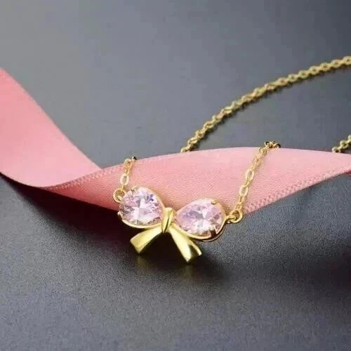 2Ct Pear Cut Simulated Diamond Women’s Bow Pendant In 14K Yellow Gold Plated