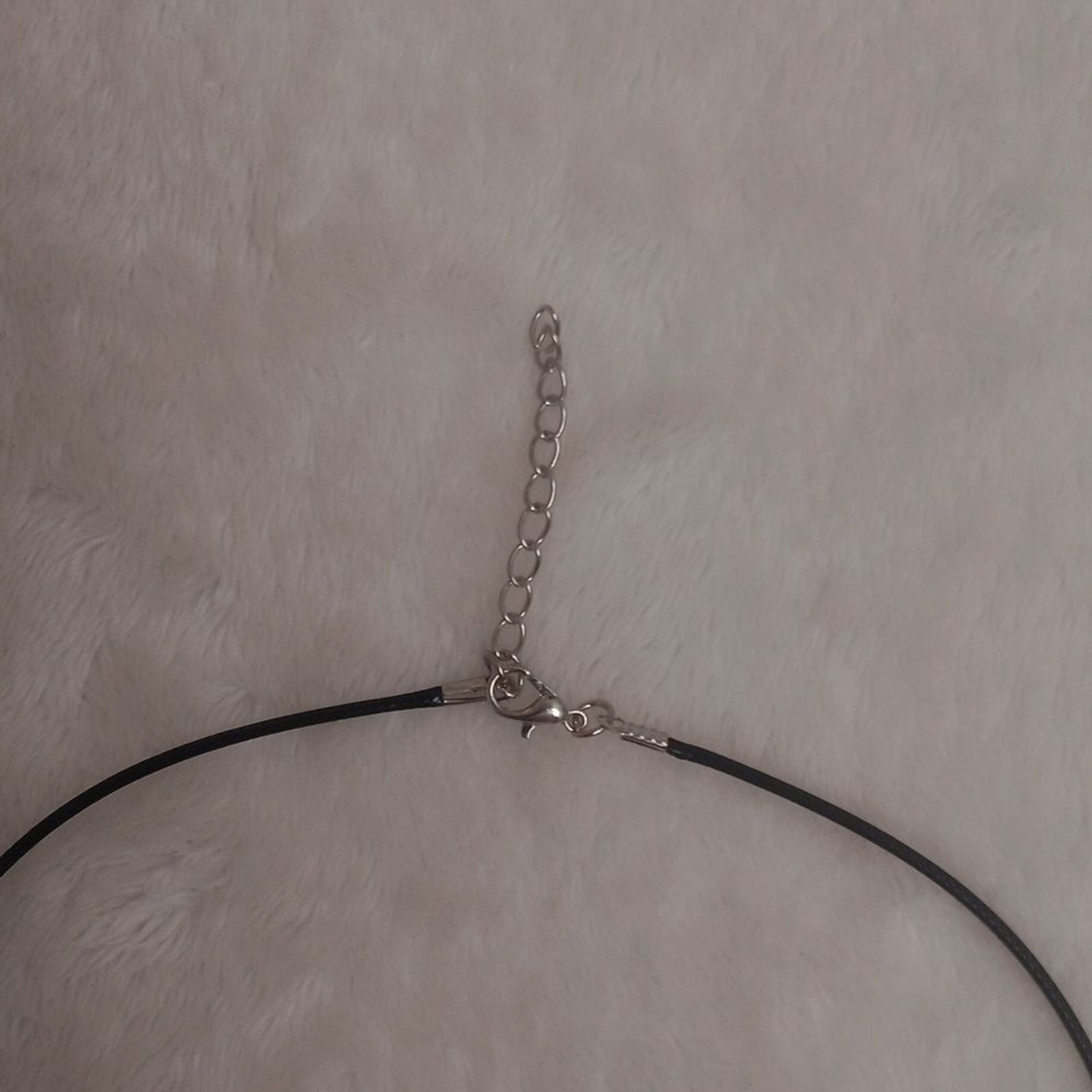 Elegant Black Necklace with Silver & White Cross Pendant