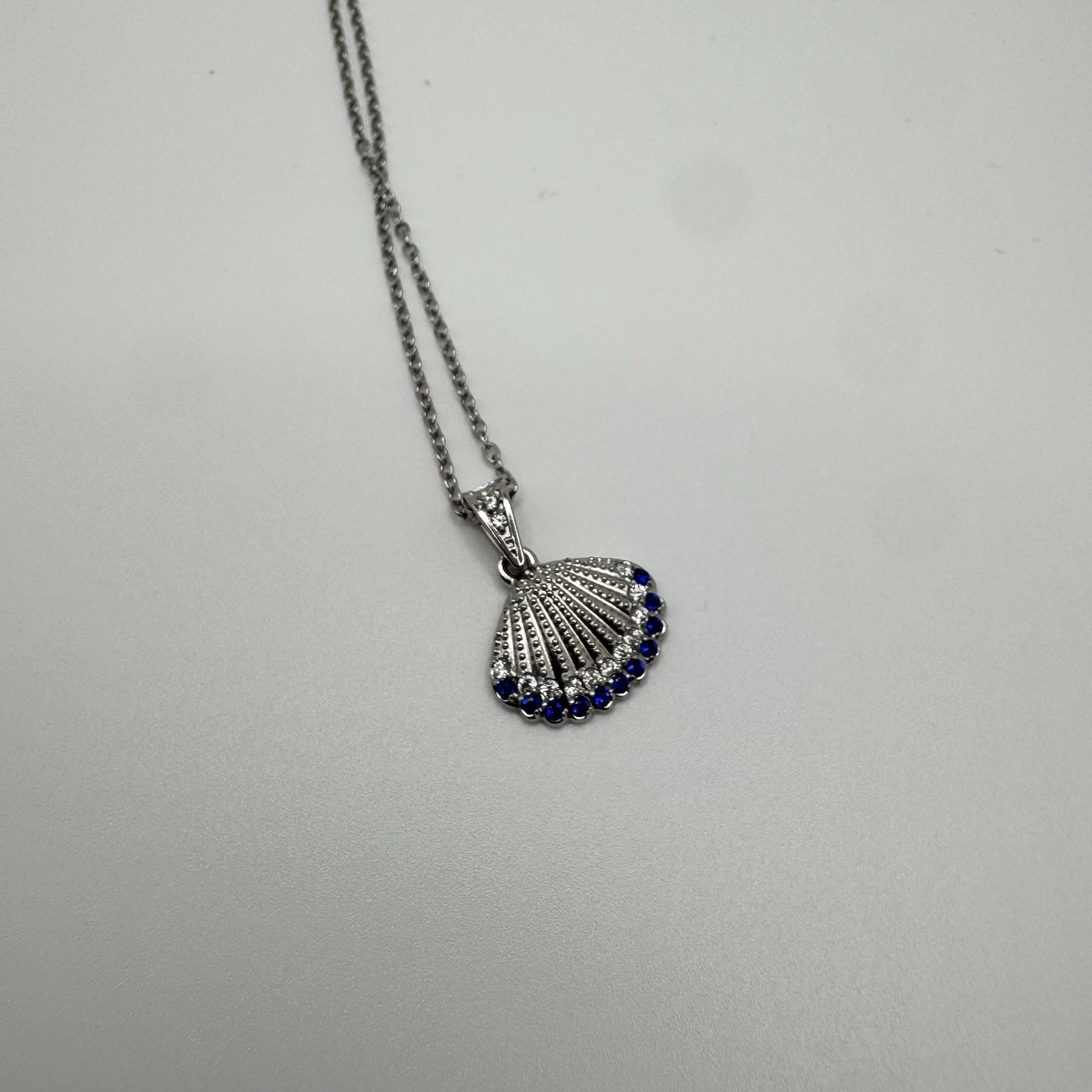 18 K White Gold Plated Steel Shell Necklace With Blue And Clear Cz Stones 18 In