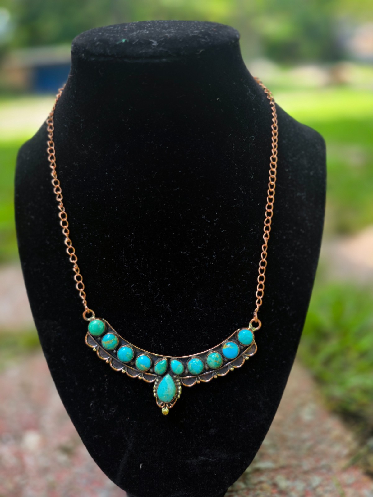 Turquoise, copper necklace. New without tags. Length is 10 in.