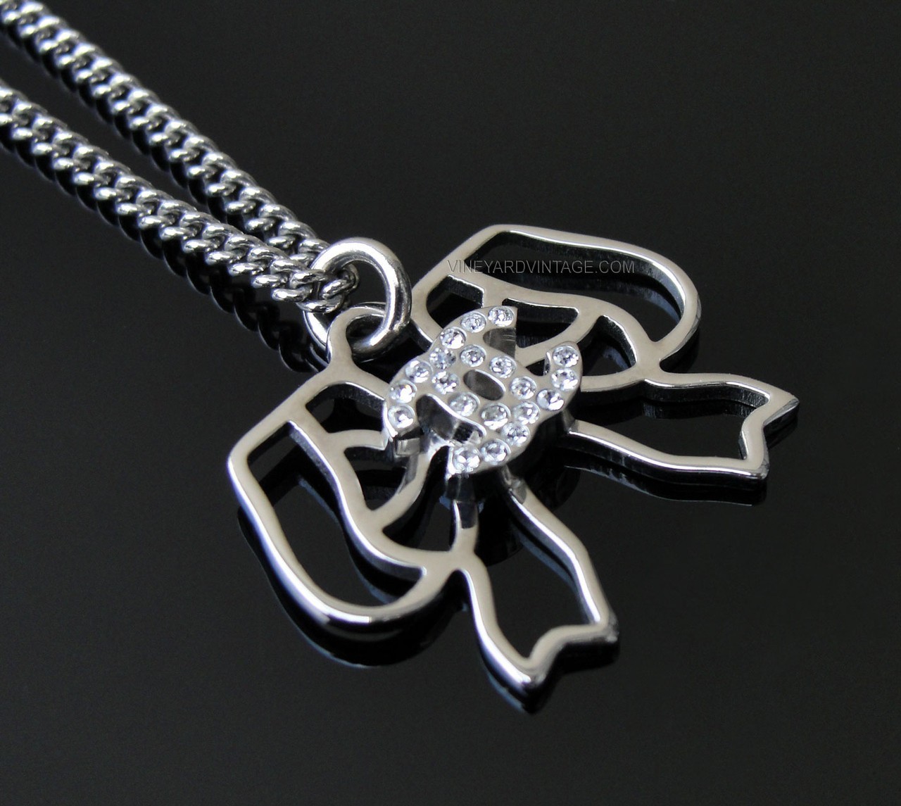 CHANEL AUTHENTIC OPEN WORK BOW & CRYSTAL CC LOGO NECKLACE