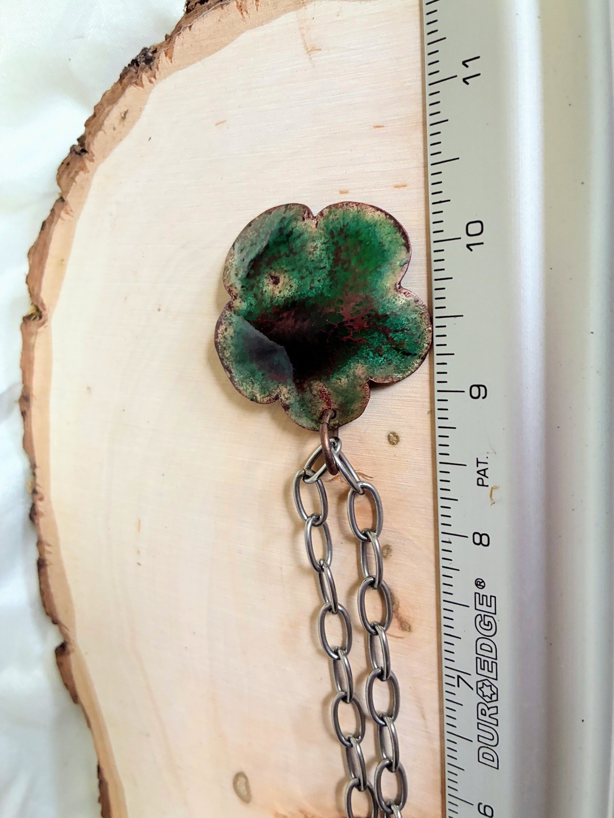 Green flower pendant necklace with white center enamel on copper pendant