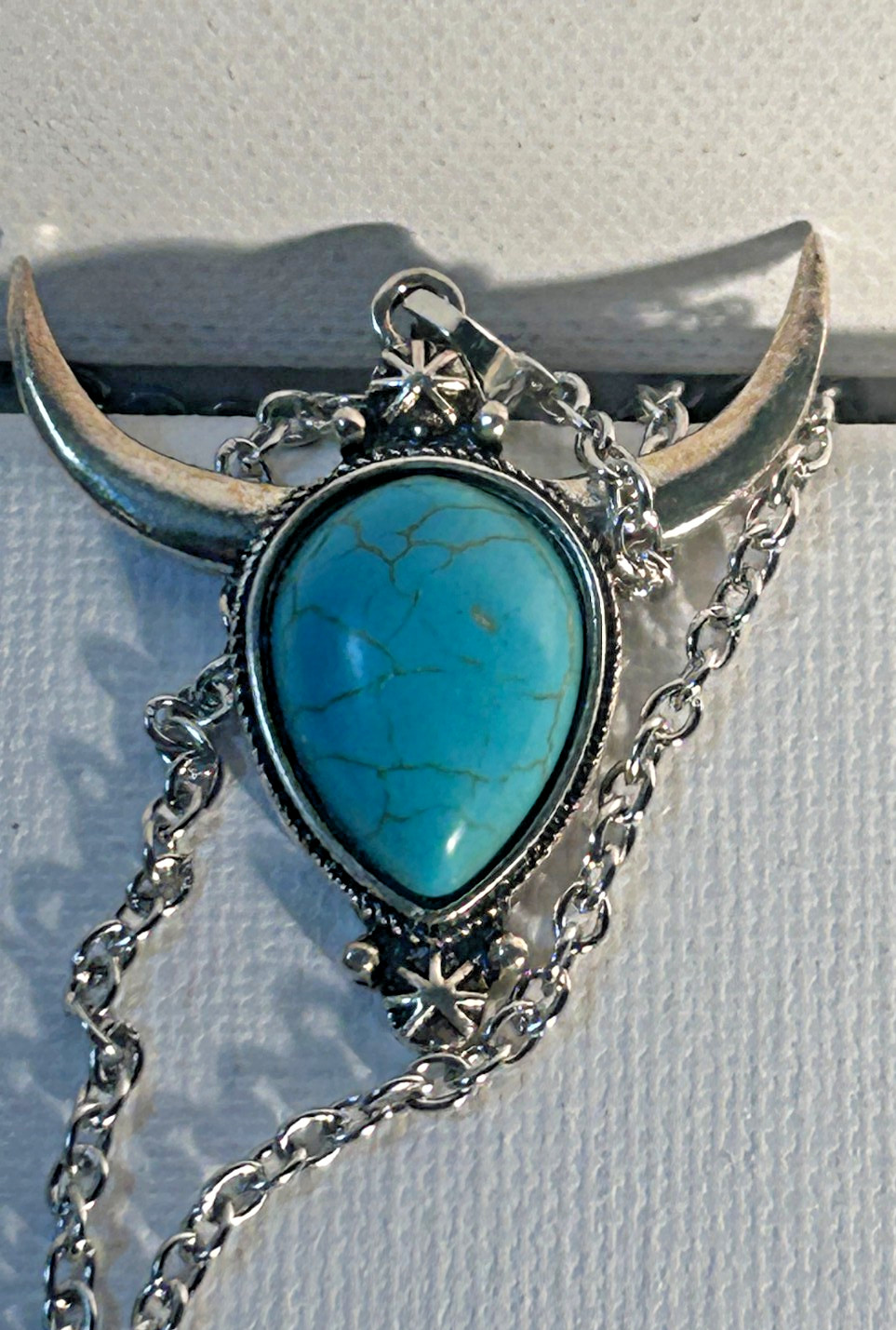 Longhorn or Bullhorn pendant with turqouise colored teardrop cabachon (10 in)