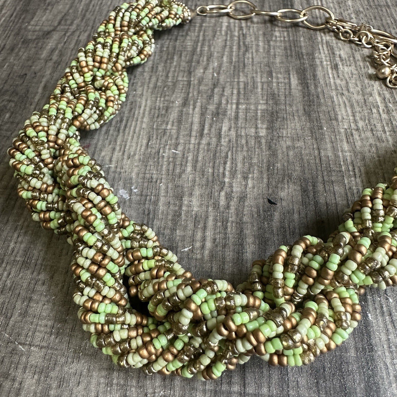 Chico’s light green and golden seed bead multi-strand braided necklace, pre-owne