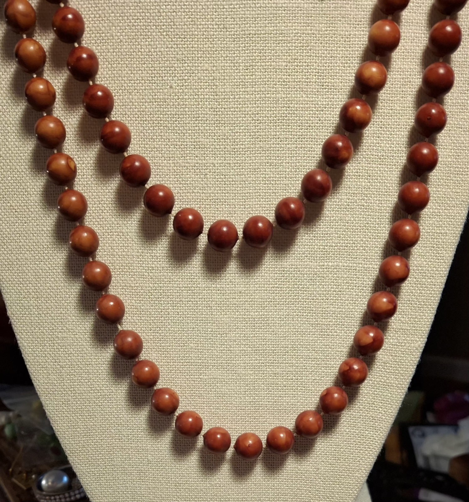 Pre-owned no brand 2 necklaces..reddish brown, orange faux wood beads