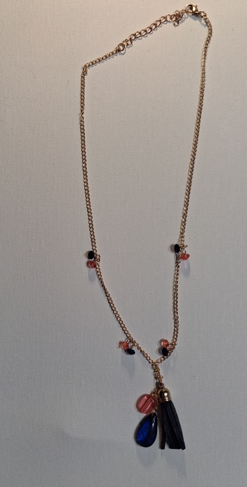 23.25 inch tassel necklace with plastic beads *big blue bead has 2 small cracks*