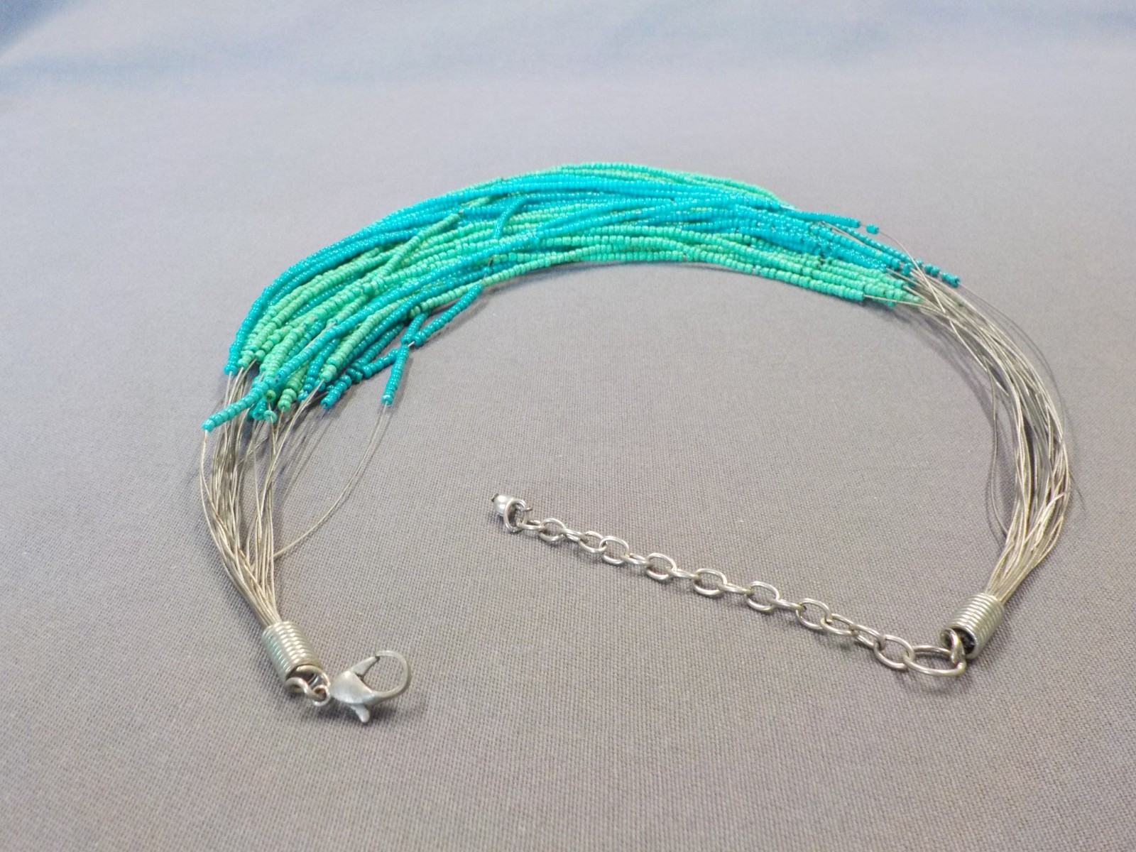 Turquoise Color Seed Beads Necklace Silver Tone Metal Multi Strand Wire Glass