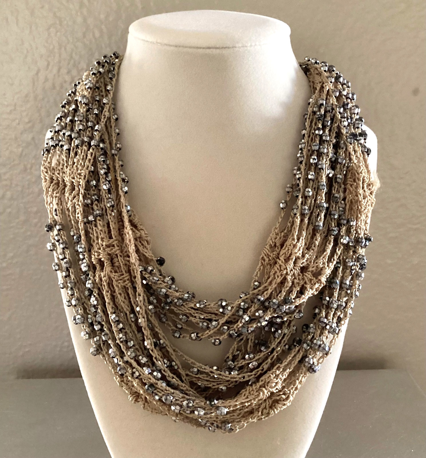 Tan crocheted necklace with silver beads, adjustable, 32 in. long