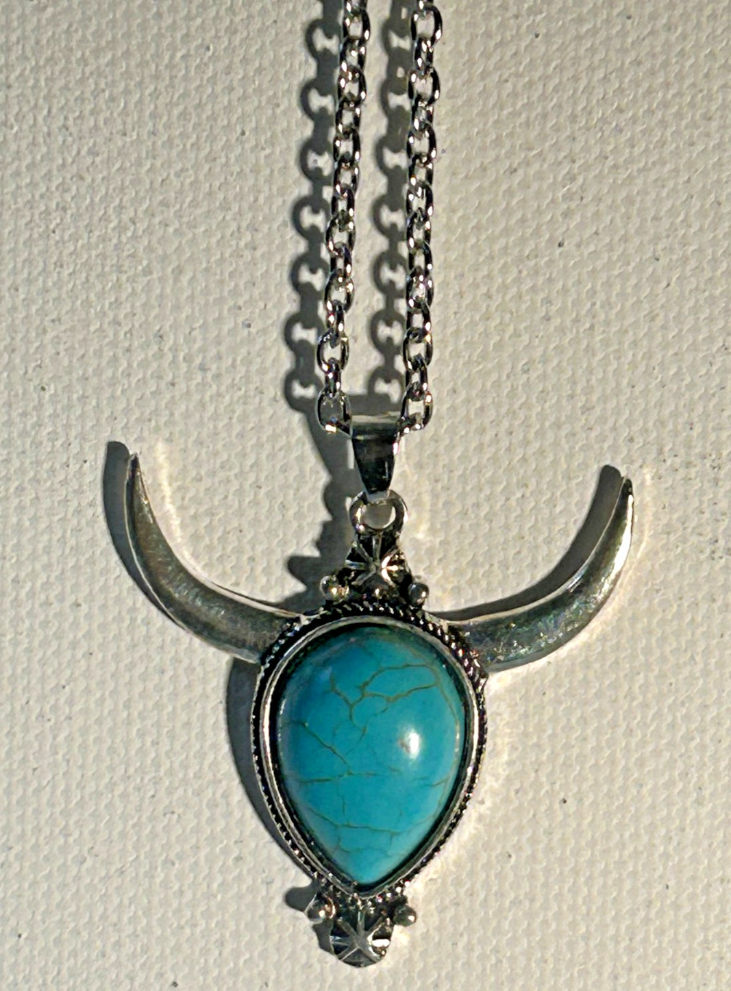 Longhorn or Bullhorn pendant with turqouise colored teardrop cabachon (10 in)