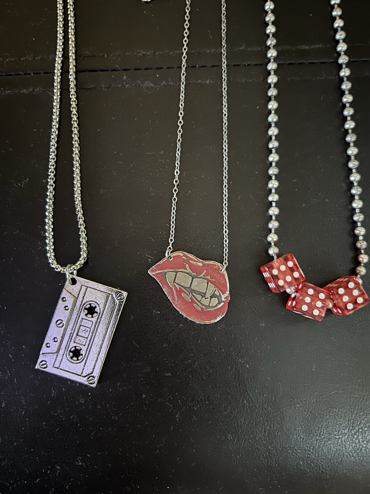Set Of Three rock ‘n’ roll necklaces Dice, Cassette Tape, Vampire Mouth Music