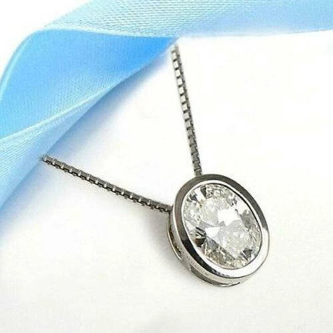 2Ct Oval Simulated Diamond Bezel Set Pendant 18″ Necklace 14k White Gold Plated