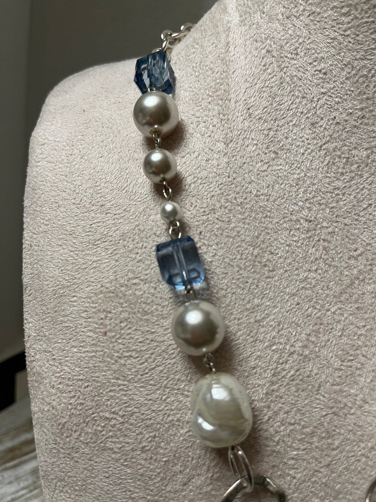 Etienne Aigner Elegant Blue and Pearl Statement Necklace with Geometric Pendant