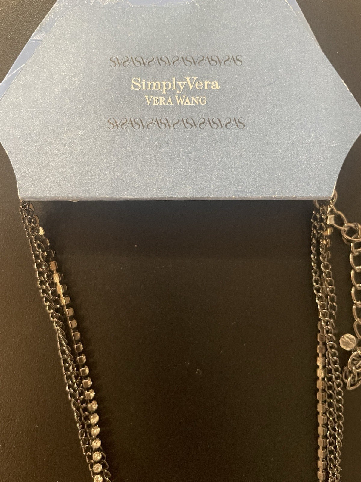 Brand New with Tag Simply Vera Vera Wang snowflake necklace 7 Sided Silver Tone