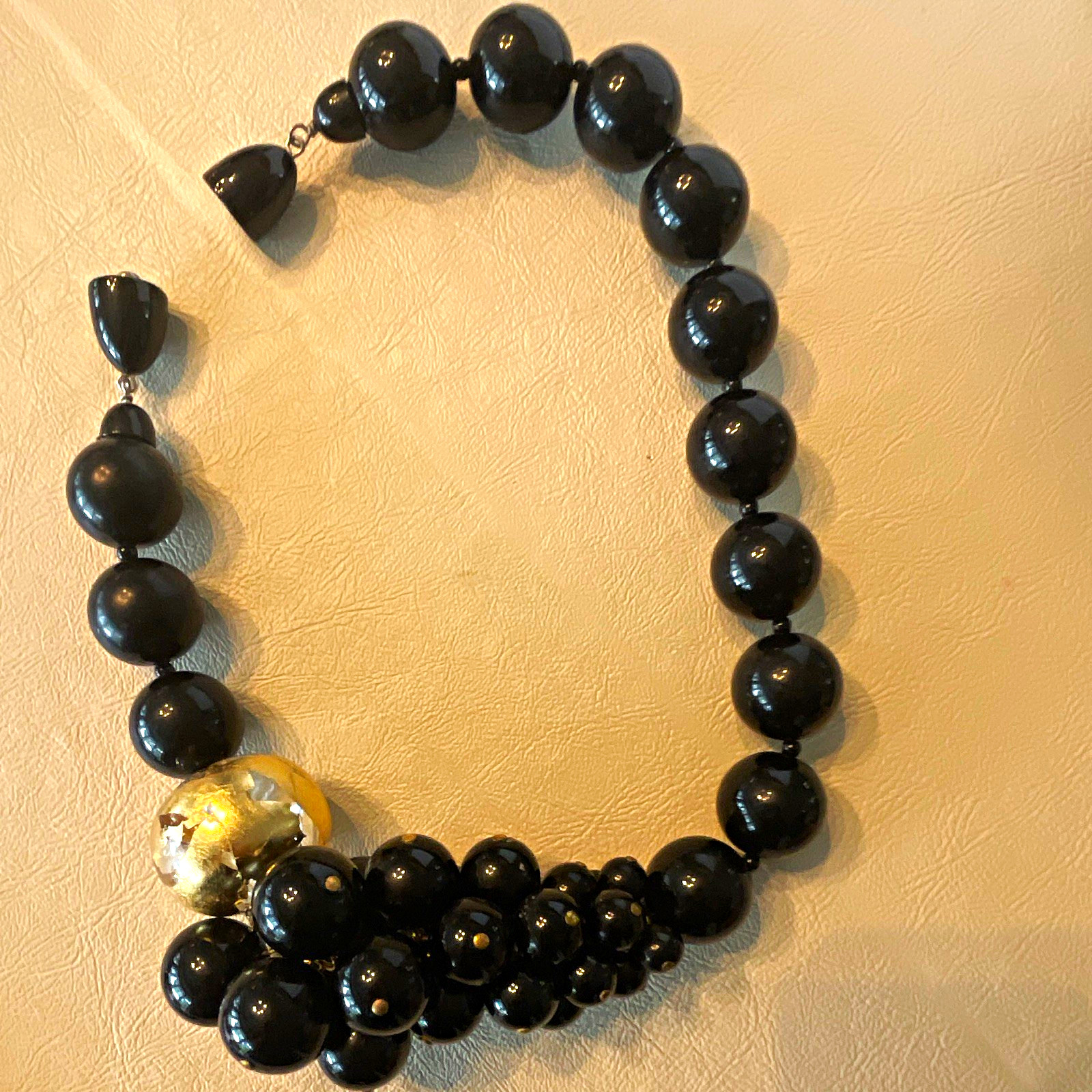 This statement piece is an authentic Angela Caputi Giuggiù chunky necklace.