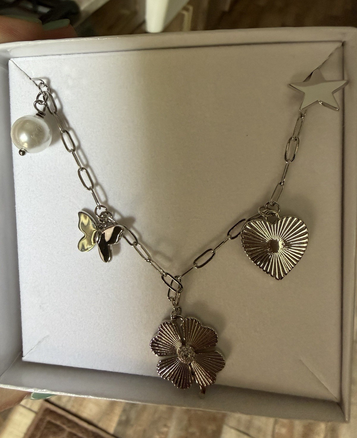 Jennifer miller silver charm necklace