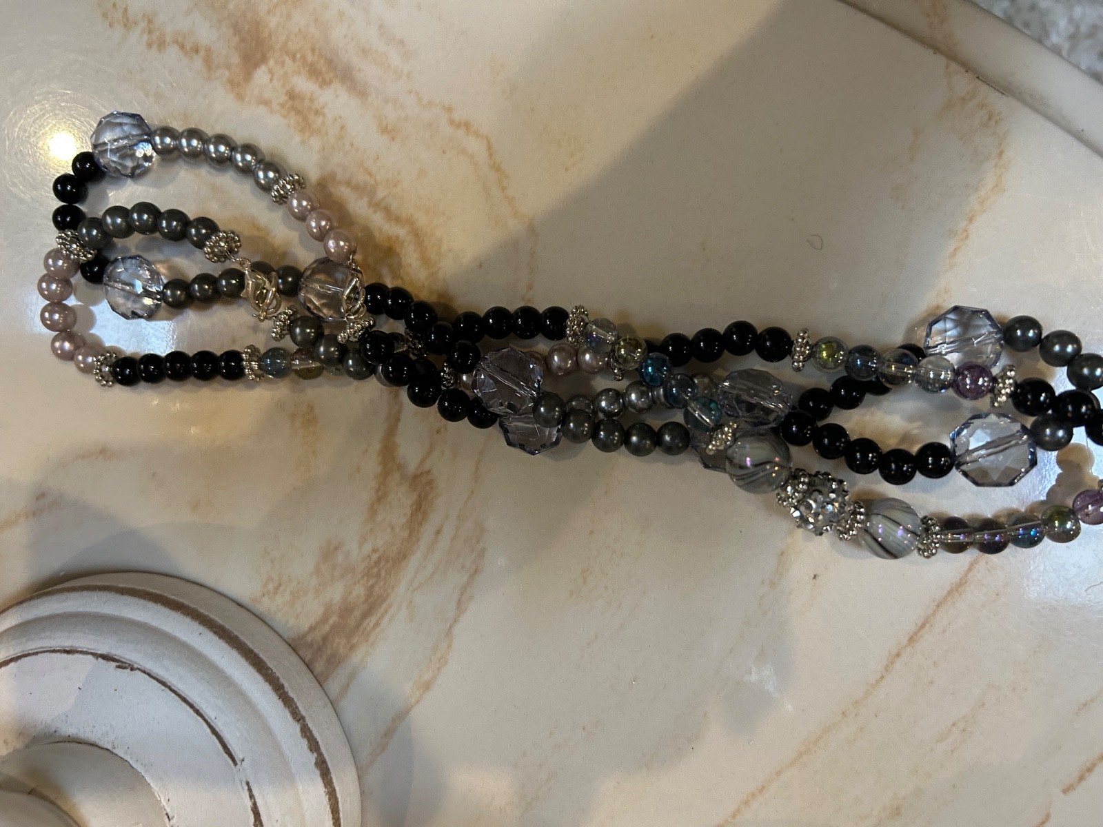 Lovely multi color beaded necklace. One side fits most.